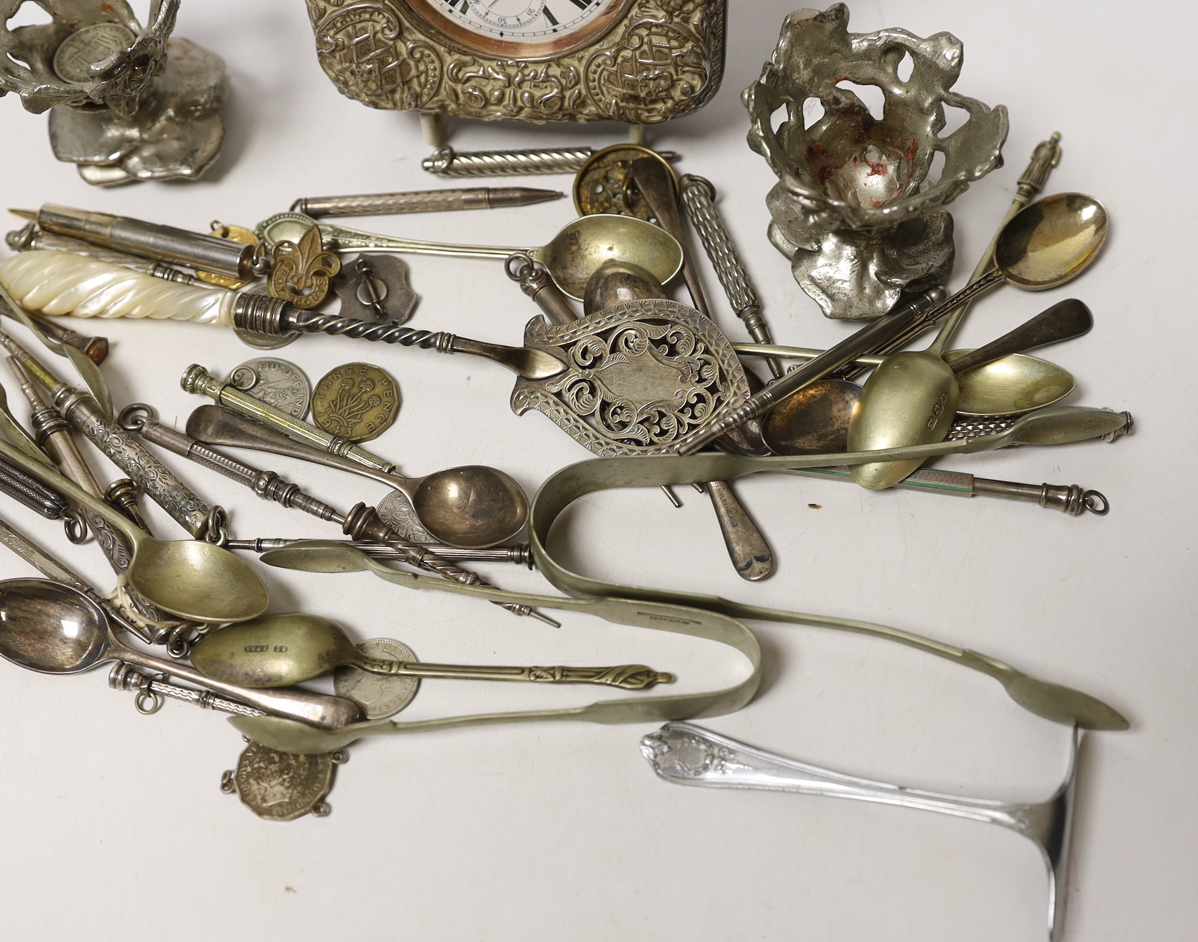 An Edwardian silver mounted travelling watch case, Birmingham, 1903, 11.4cm, and other items including plated flatware, coins and a group of propelling pencils including Sampson Mordan & Co, etc.